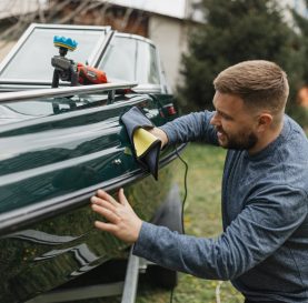 Applying finishing touches on a polished boat surface